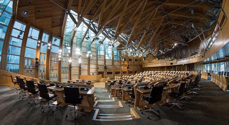 An empty auditorium room with bright lights